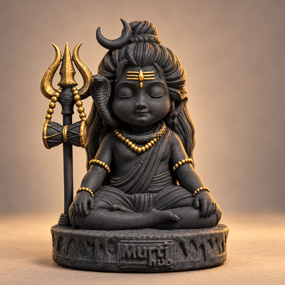 Baal Shiva meditating with trishul and damru in Divya Black with gold-toned details, 9 cm